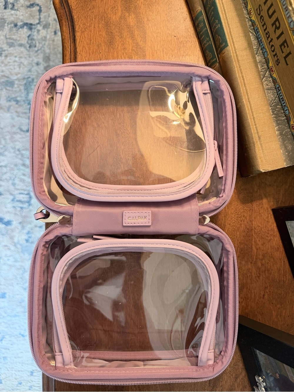 Calpak Clear Travel Cosmetic Case in Light Lavender Pink